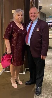 Kelvin and his wife Christine dressed up for a formal evening